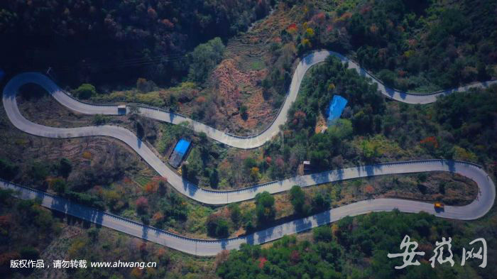 妙道山公路已成沿途村民致富路。