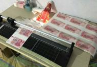 假币骗真钞 民警扮摊贩蹲守近10日抓获疑犯