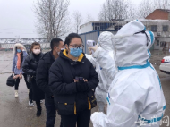蒙城严守“防线” 对入城人员进行体温检测