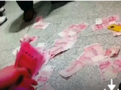 合肥火車站一男子酒后撒錢 滿地百元鈔票引大批旅客圍觀