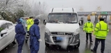 六安裕安交通局一线人员严守高速路口，顶风冒雪测体温