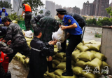 直面新一轮强降雨  合肥包河城管24小时巡堤查险保安全