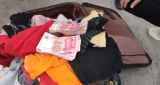 合肥：行李箱从大巴车上掉落  2万元学费丢失