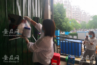記者探訪六安中風險小區：一道小窗口，遞進去的是生活是希望