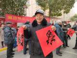 新春走基层|  蚌埠：迎新春写祝福送春联 小区居民笑盈盈