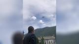 直击四川泸定地震 | 两架救援直升机在震区泸定县上空察看灾情