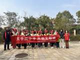 大手拉小手，共创文明城——安庆经开区乌岭社区开展学雷锋日活动