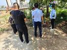 宜秀区大龙山镇中心社区：工地种菜引纠纷 社区调解促和谐