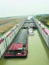 “水上火車”裝載萬噸貨物過“河” 江淮運河迎來首支船隊