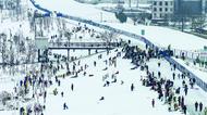 蚌埠：雪后“靚淮河” 化作滑雪場