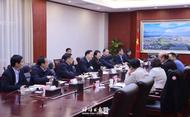 黃曉武與查維斯集團副總裁、亞洲/非洲總裁張龍舉行工作座談