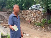 “不交錢就砸車”，游客稱在河南一景區被村民索要停車費 當地回應：已批評教育當事人
