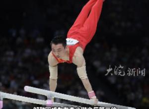 第21金！邹敬园卫冕体操男子双杠金牌
