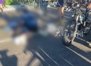 父亲带孩子跟团骑行，孩子不慎摔倒后被汽车碾压身亡，人民网评：这起悲剧有哪些“痛点”？