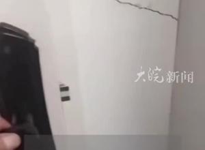 湖北武昌一小区楼体出现多处开裂 村民：疑因附近河道施工所致 当地回应：正在核实