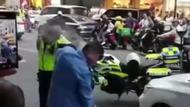 東莞一“制服男”闖紅燈毆打鐵騎被控制