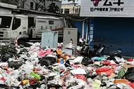 廣西桂林一路口被堆滿垃圾 當地回應：中午已經清理
