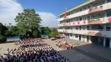 怀远县龙亢镇学区中心学校举行新队员入队仪式