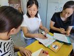 推门听课成常态 深入课堂抓教学