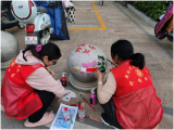 携手涂鸦暖民心 美好家园大家建